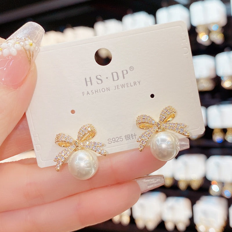 Blingy Bow Pearl Gold - Ear Studs