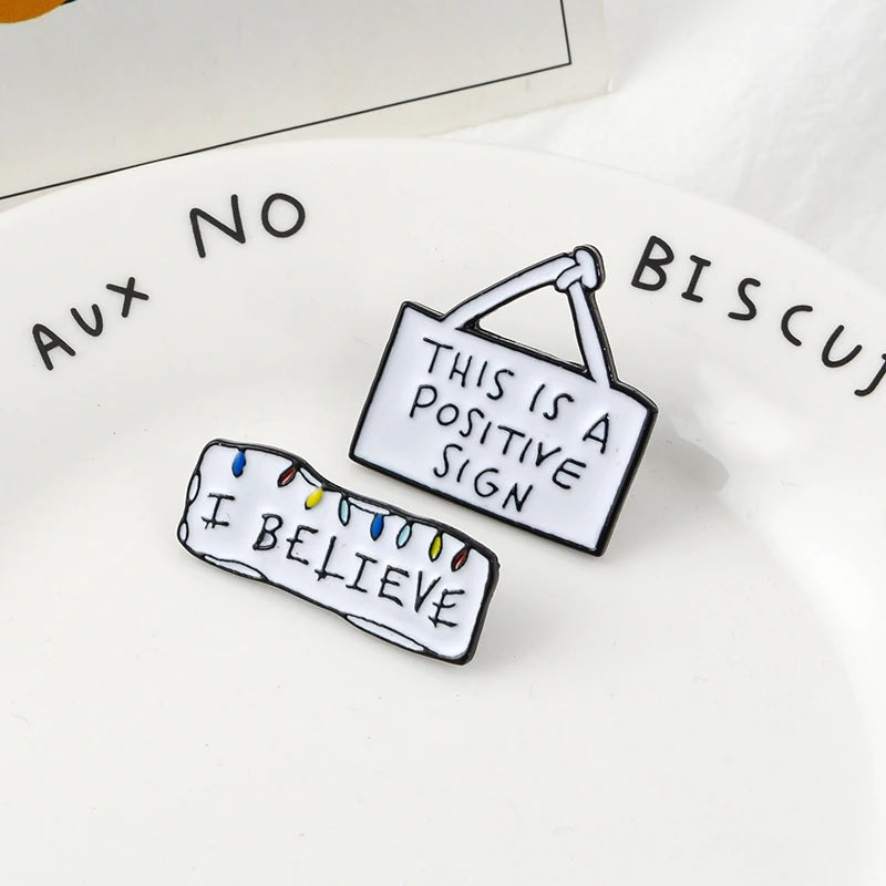 This is a Positive Sign Enamel Pin